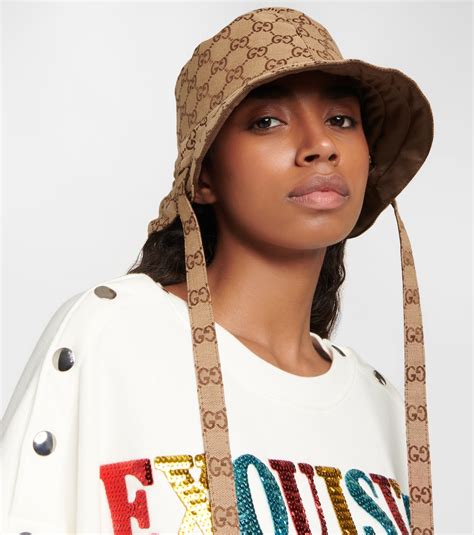 gucci reversible brown gg bucket hat|who made Gucci bucket hat.